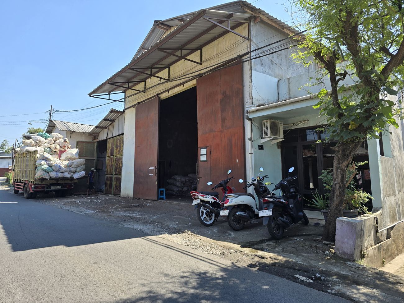 Our family kapok warehouse in East Java, loading for export