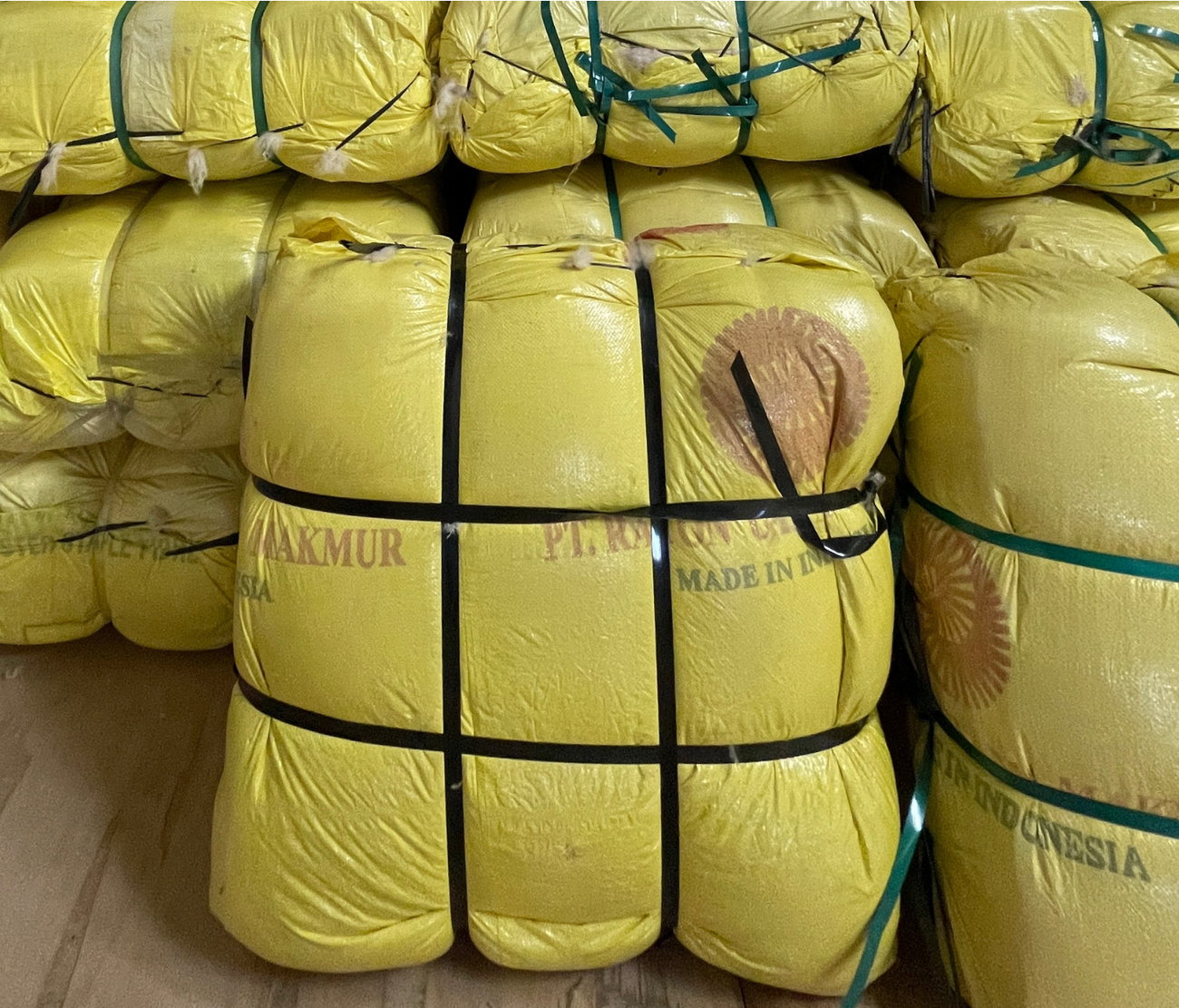 25 kg kapok bales in yellow PP wrap