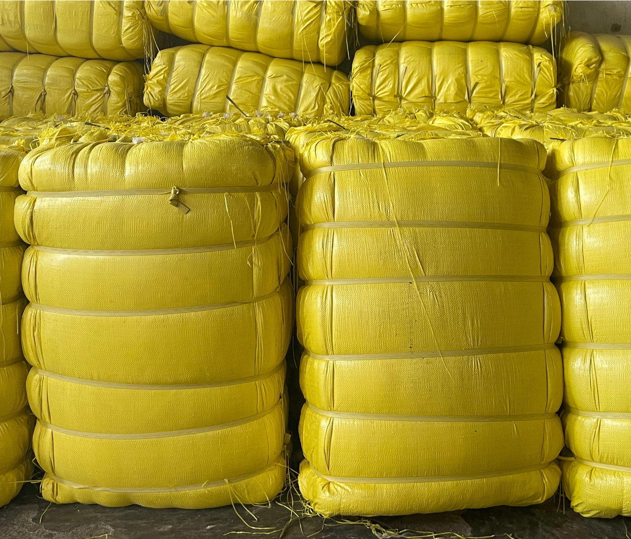 50 kg kapok bales in yellow PP wrap